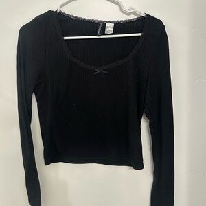Black long sleeves with bow